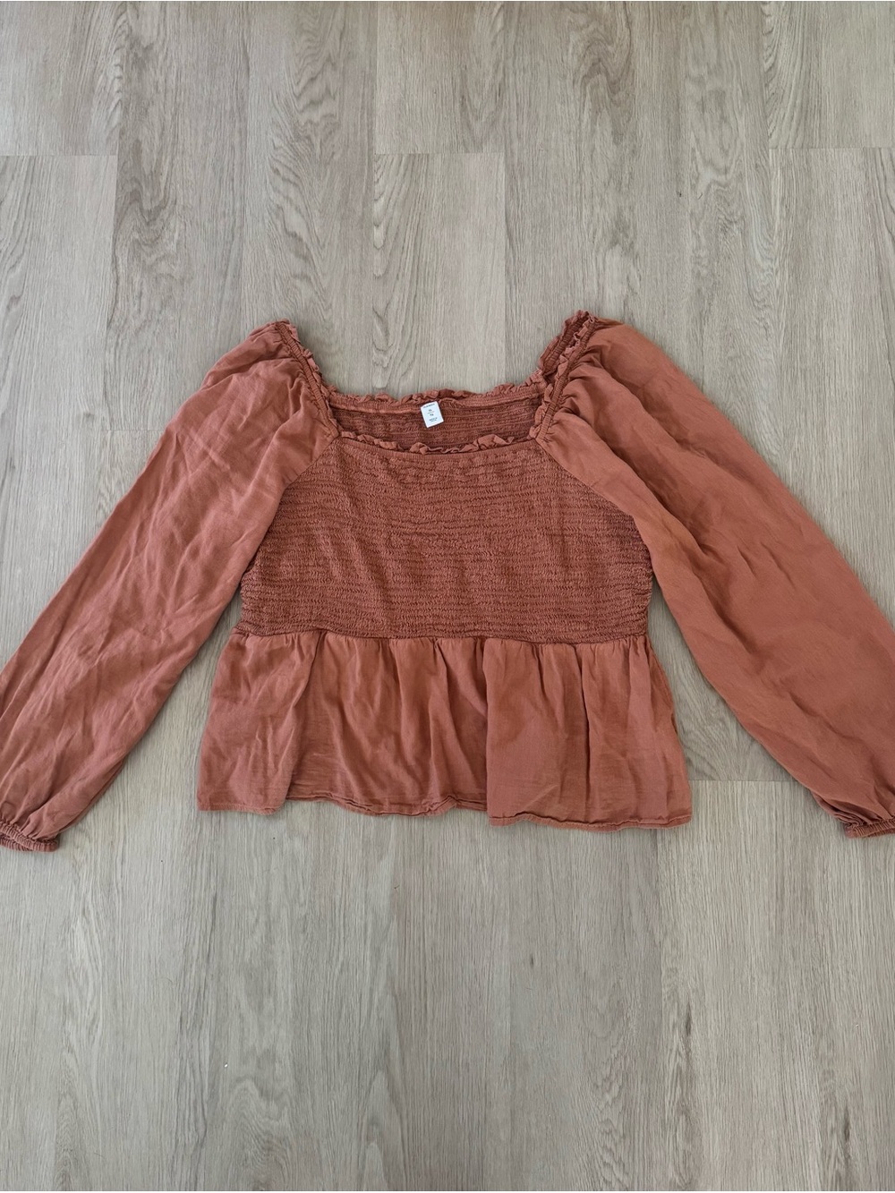 Rust Smocked Peplum Long-Sleeve Top